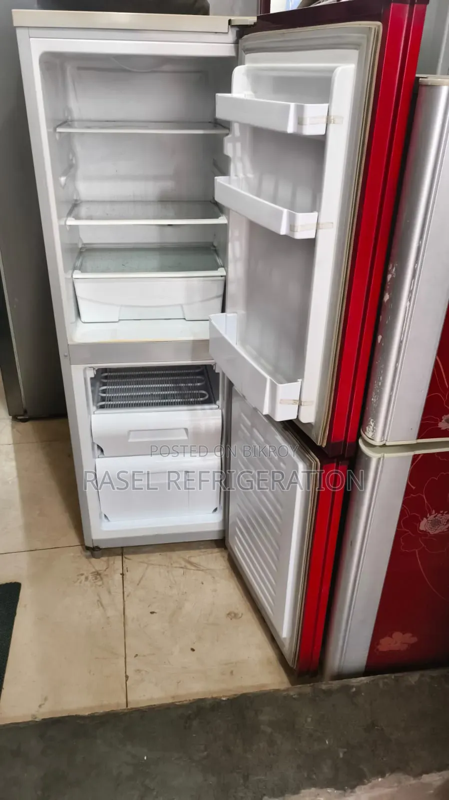 Red 15 CFT LG running fridge for sale.