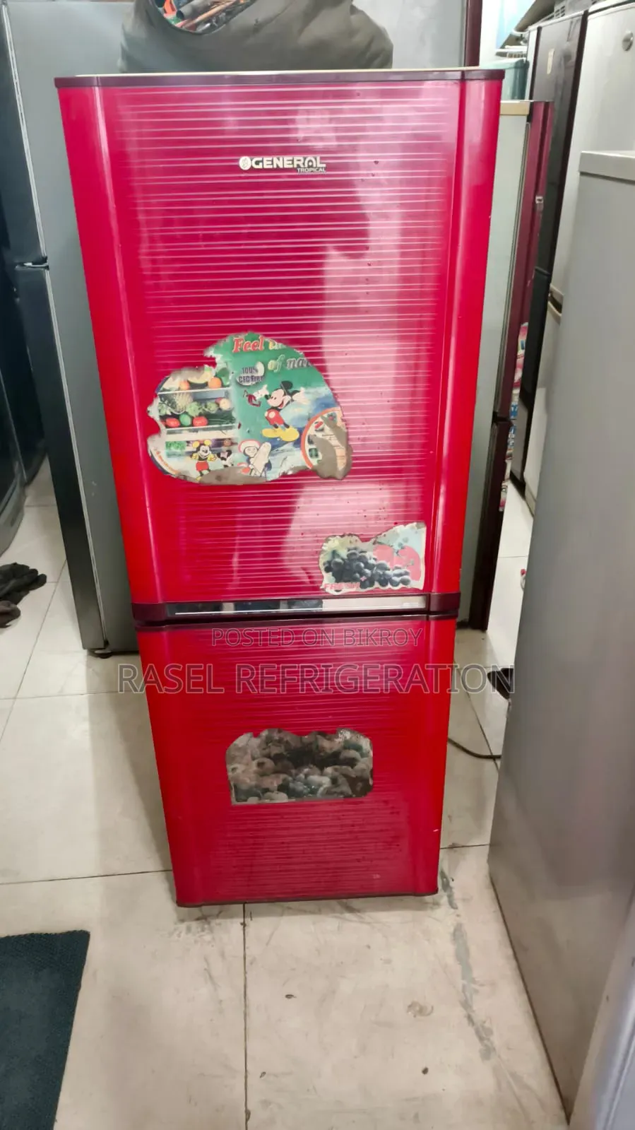 Red 15 CFT LG running fridge for sale.