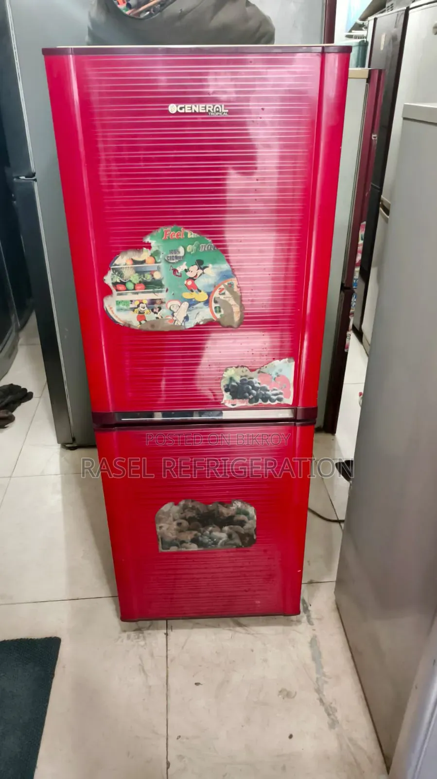 Red 15 CFT LG running fridge for sale.