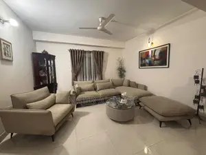মডার্ন এল-শেপড সোফা সেট উইথ মার্বেল টি-টেবিল