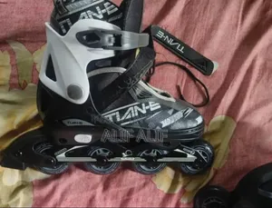 Tian E Skating Shoes