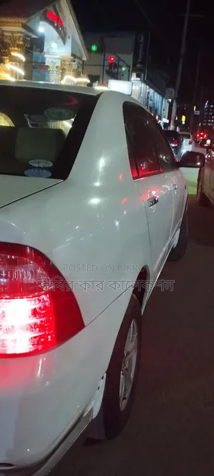 টয়োটা করোল্লা ২০০৬ সাদা