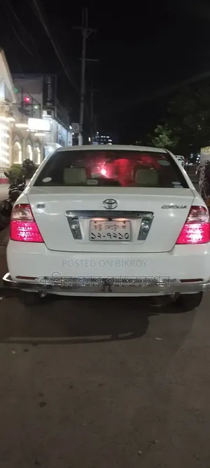 টয়োটা করোল্লা ২০০৬ সাদা
