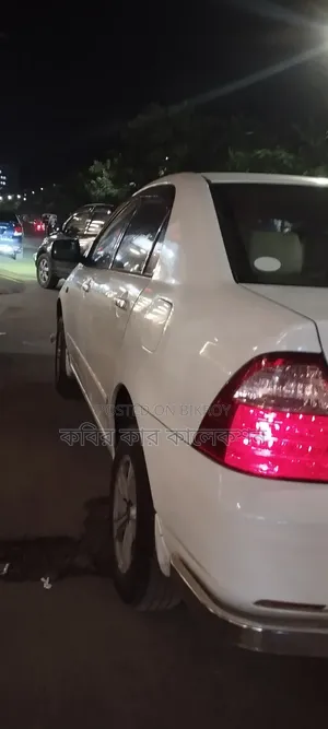 টয়োটা করোল্লা ২০০৬ সাদা