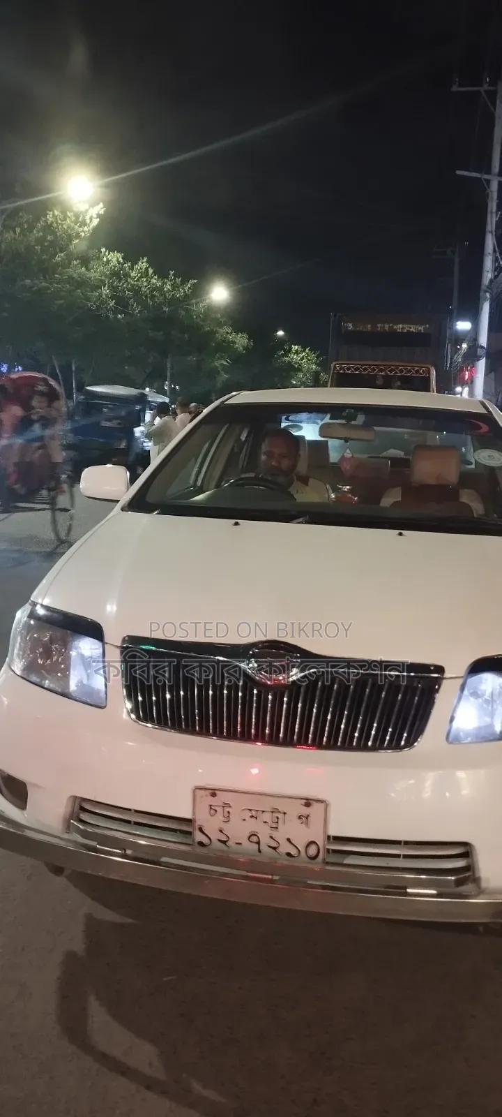 টয়োটা করোল্লা ২০০৬ সাদা