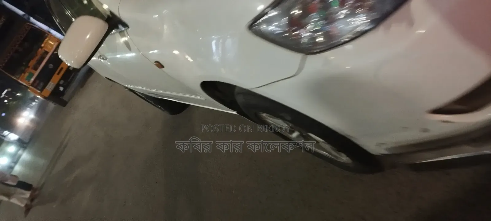 টয়োটা করোল্লা ২০০৬ সাদা