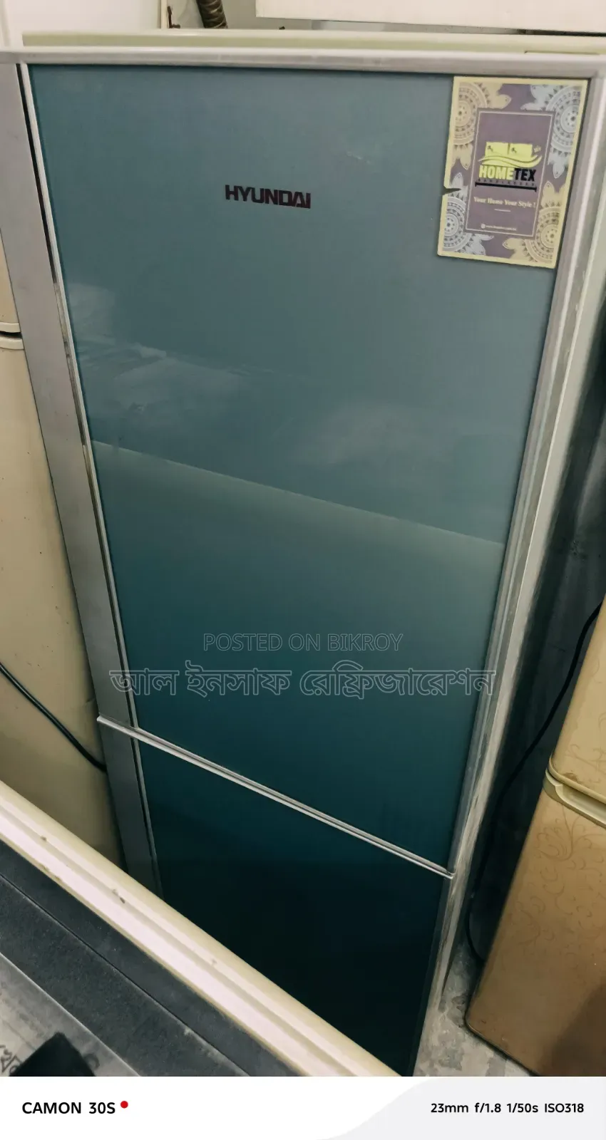 A twelve and a half cubic feet glass door refrigerator will be sold