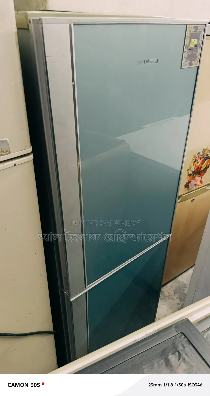 A twelve and a half cubic feet glass door refrigerator will be sold