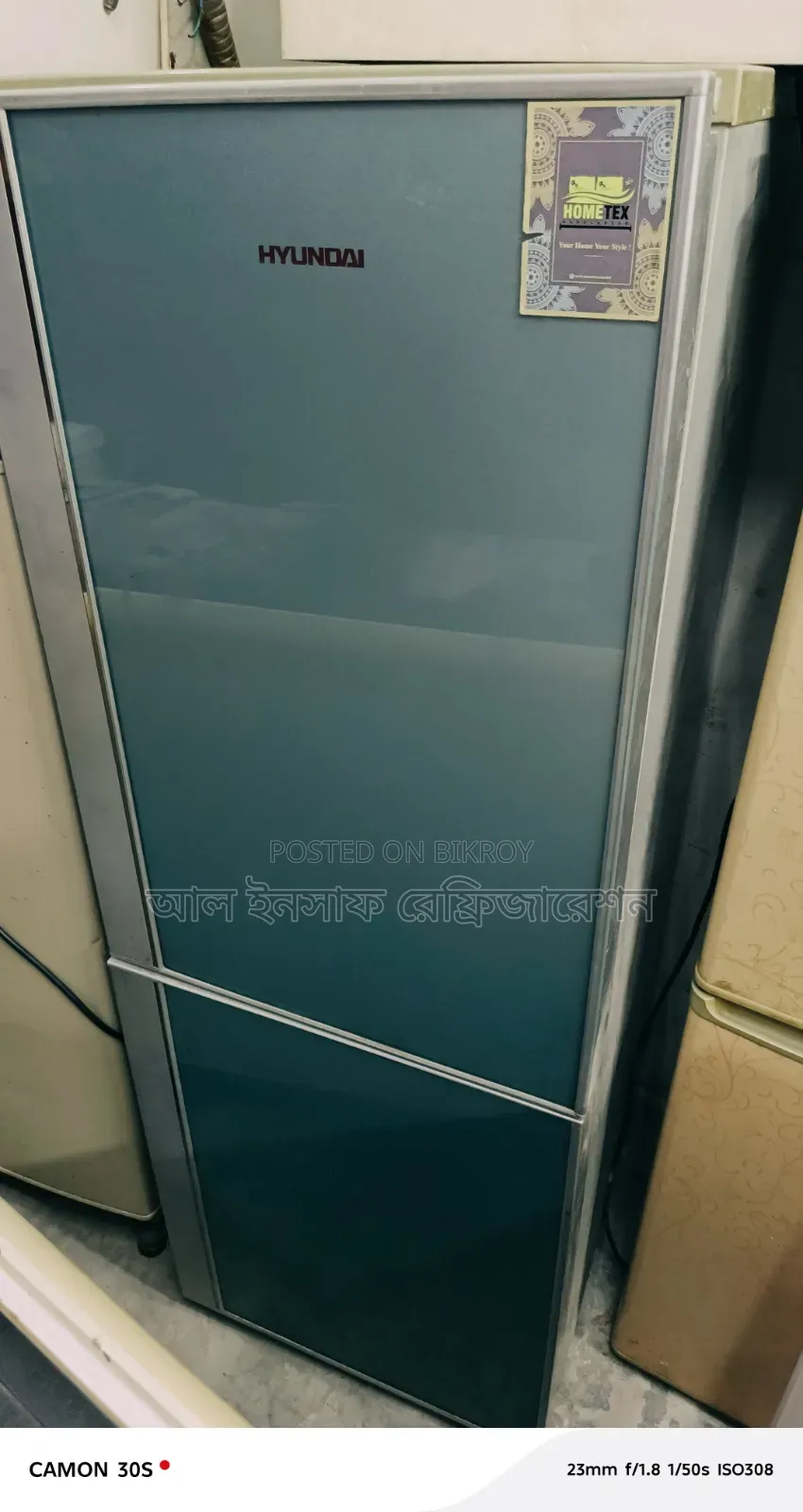A twelve and a half cubic feet glass door refrigerator will be sold