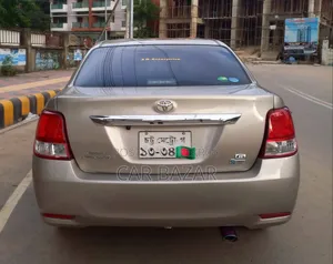 টয়োটা এক্সিও ১.৫ জি ২ডব্লিউডি ২০১২ সোনালী