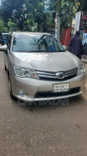 টয়োটা অ্যাক্সিও ১.৫ লাক্সেল টু-হুইল ড্রাইভ ২০১৩ গোল্ড