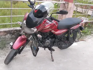 বাজাজ ডিসকভার ১০০ ২০১৬ লাল