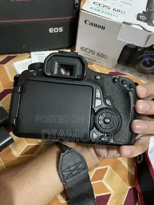 Canon 60D + Canon 18-200mm Zoom Lens