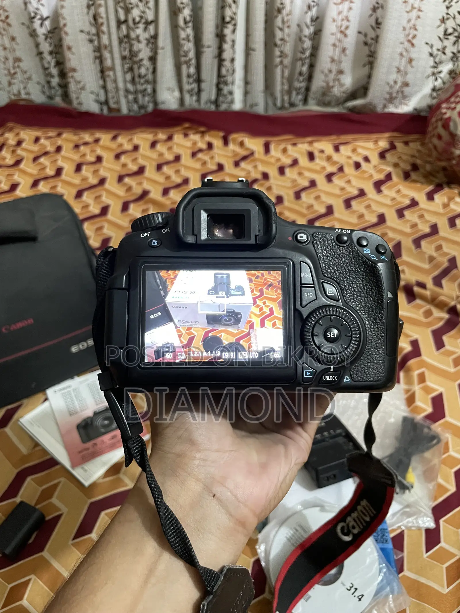 Canon 60D + Canon 18-200mm Zoom Lens