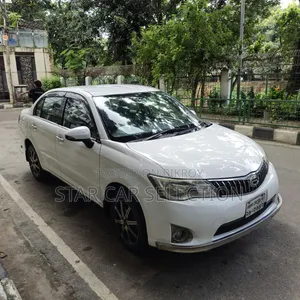 টয়োটা এক্সিও ২০১২ সাদা