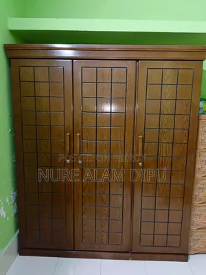 A beautiful and sturdy 3-door wooden wardrobe for sale.