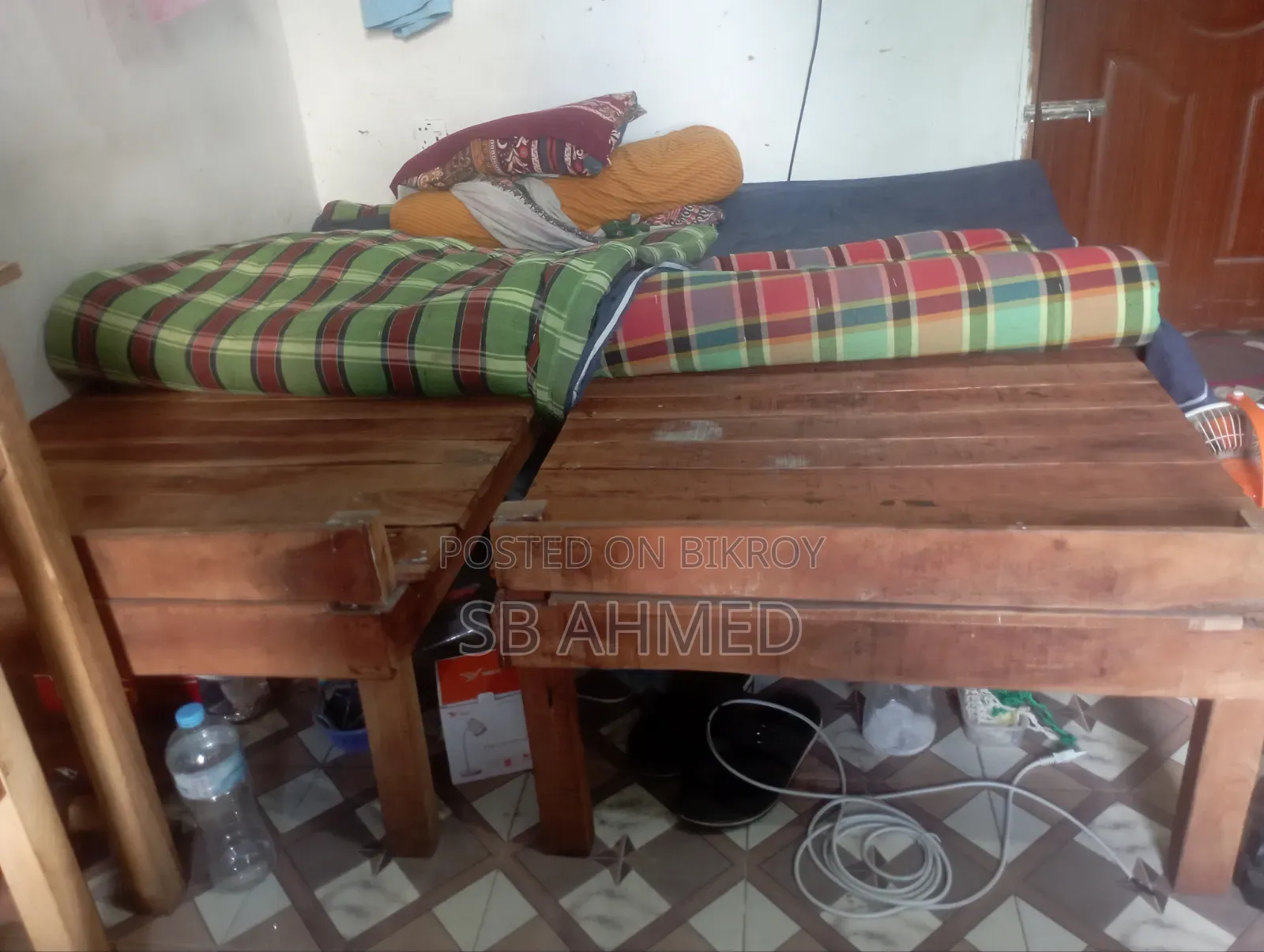 Two Tables and Two Single Beds