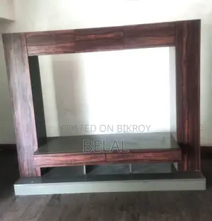 TV Stand :Made Entirely of Foreign Wood. Used for a Short Time.