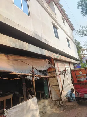 5 shops on the ground floor, Madrasah on the 2nd and 3rd floors, monthly rent 15,000৳