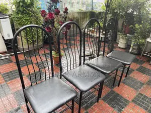 4 Black Metal Frame Cushion Chairs – Good Condition