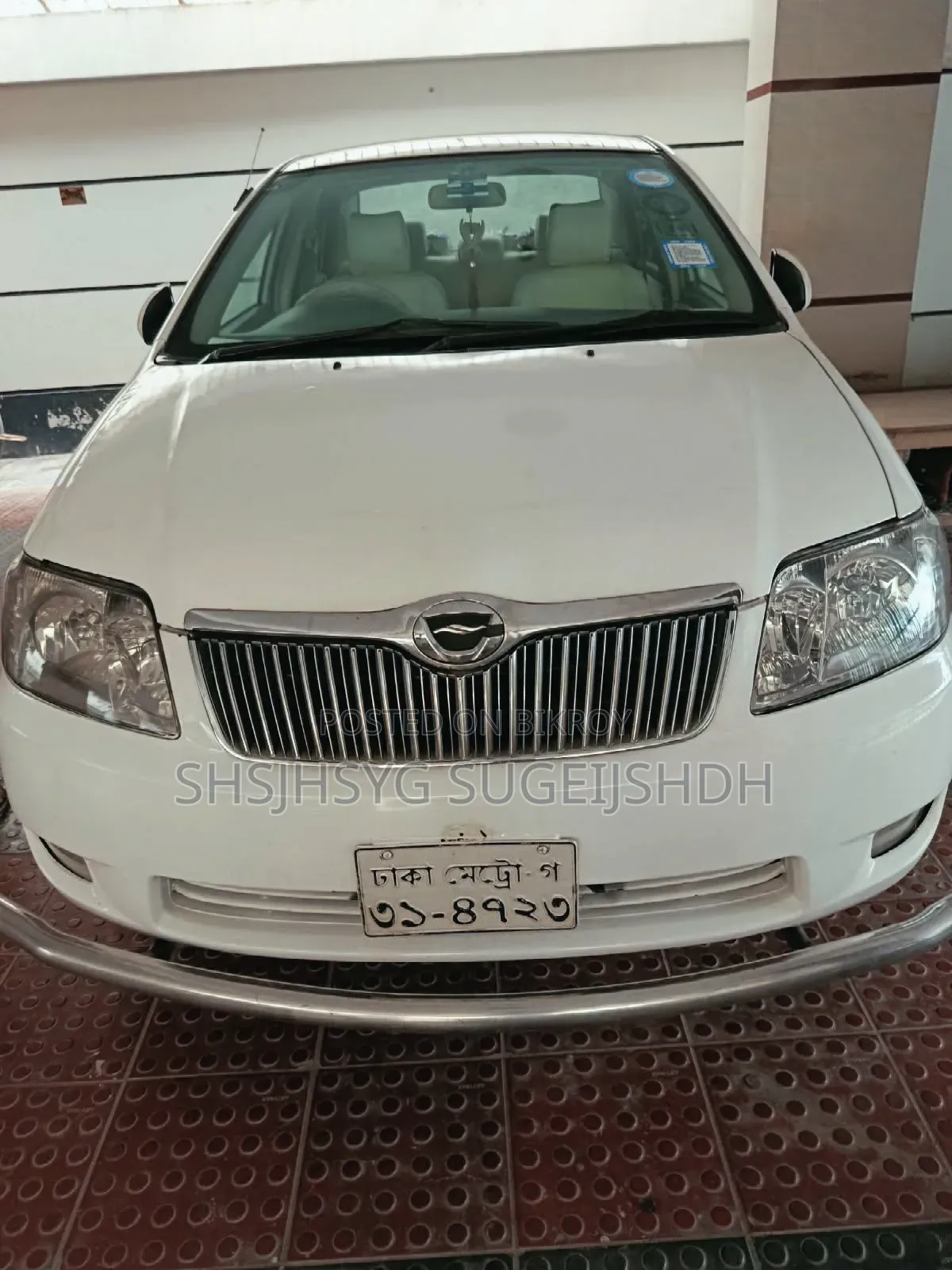 টয়োটা করোলা ২০০৫ হোয়াইট