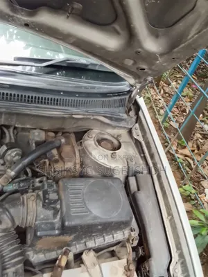 টয়োটা করোলা ২০০৫ হোয়াইট