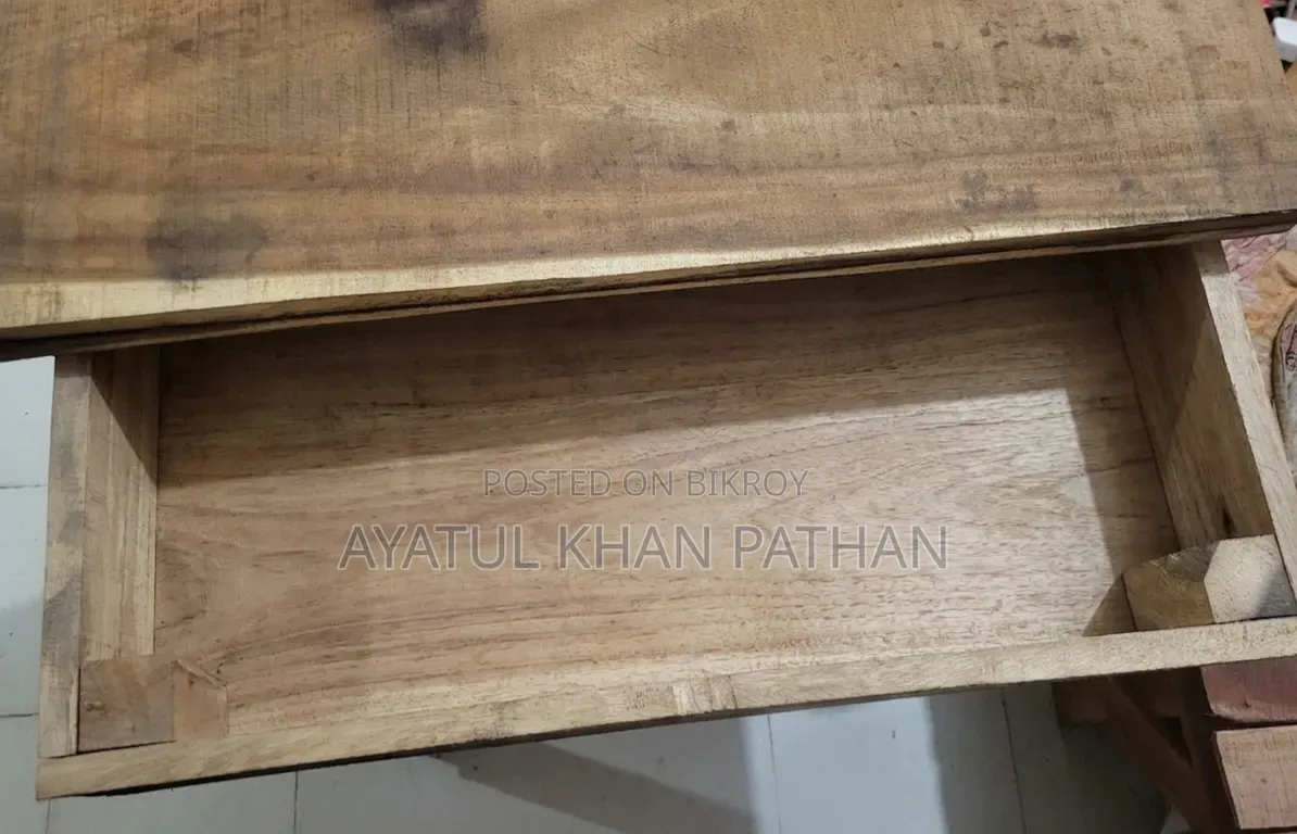 Wooden bed frame and table will be sold.