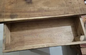 Wooden bed frame and table will be sold.