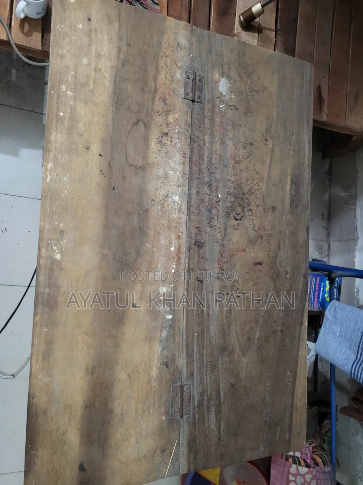 Wooden bed frame and table will be sold.