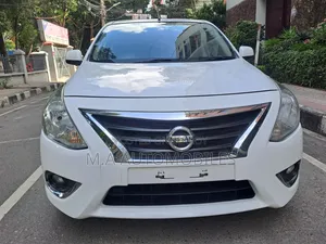 নিসান আলমেরা ২০১৫ সাদা