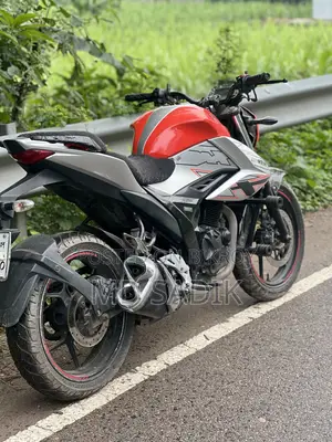 নিউ সুজুকি জিক্সার ২০২৫ অরেঞ্জ