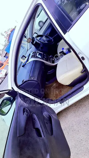 টয়োটা এক্সিও ২০১০ সাদা