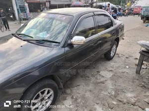 টয়োটা করোলা ১৯৯২ গ্রে