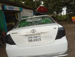 টয়োটা এক্সিও ২০১২ সাদা