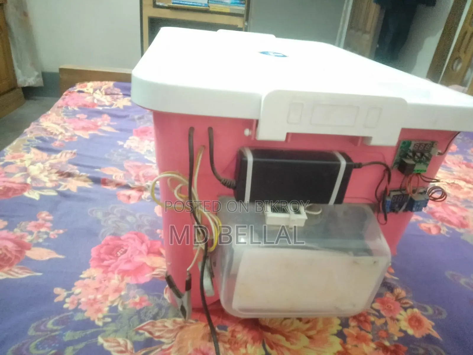 Automatic incubator for hatching chicken and quail eggs