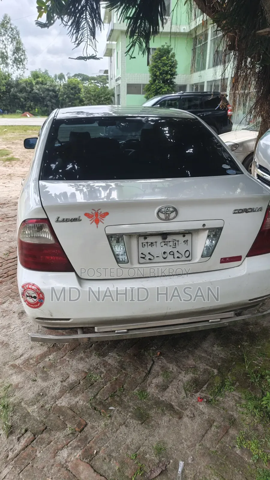 টয়োটা করোল্লা ২০০৪ সাদা