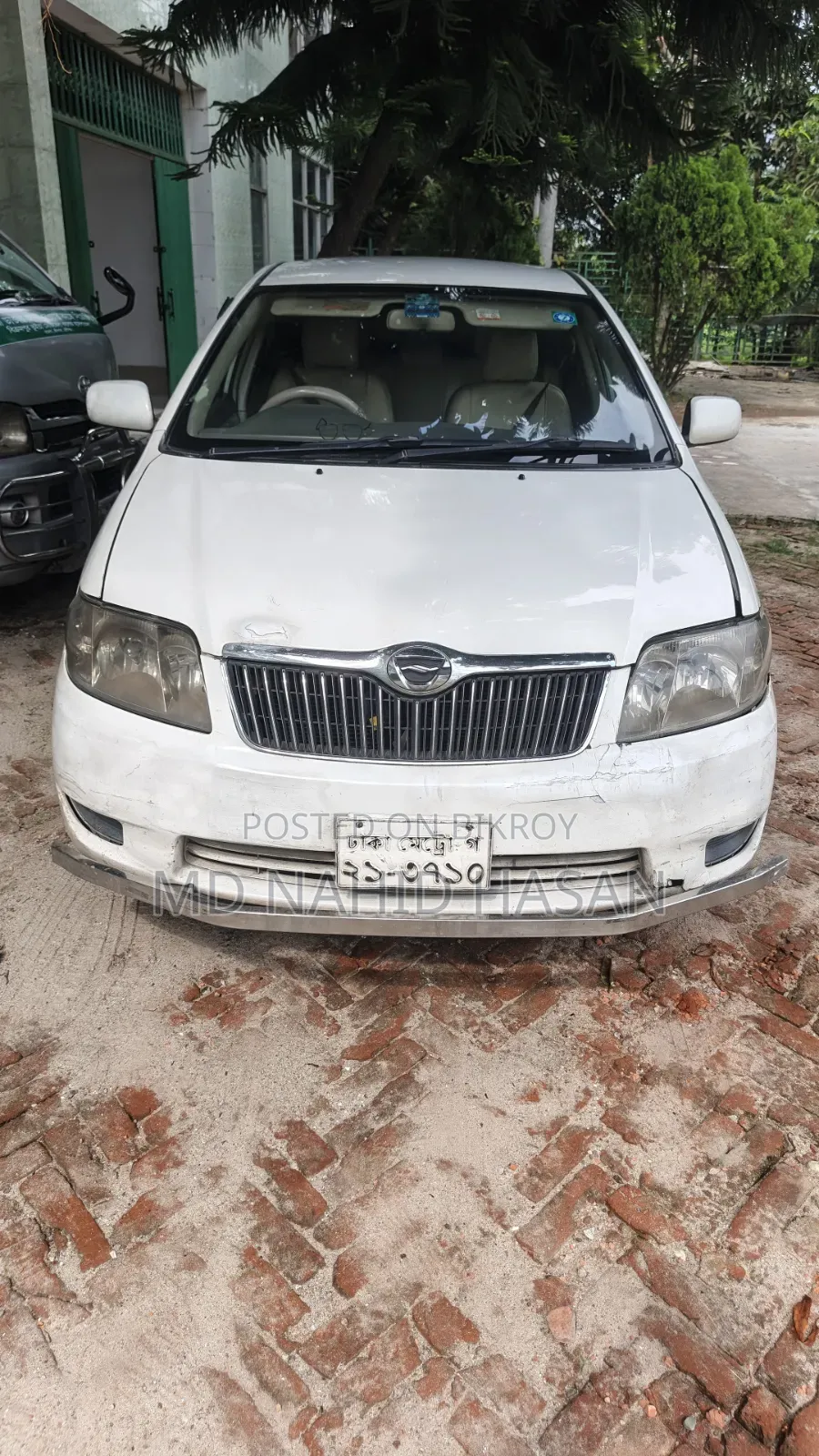 টয়োটা করোল্লা ২০০৪ সাদা