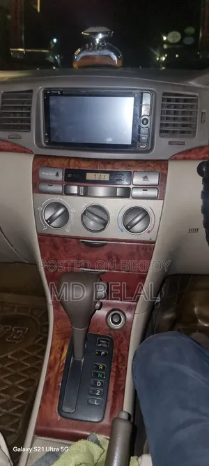 টয়োটা করোল্লা ২০০৬ সাদা