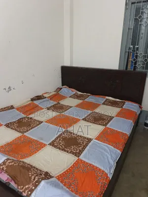 A double bed with mattress will be sold