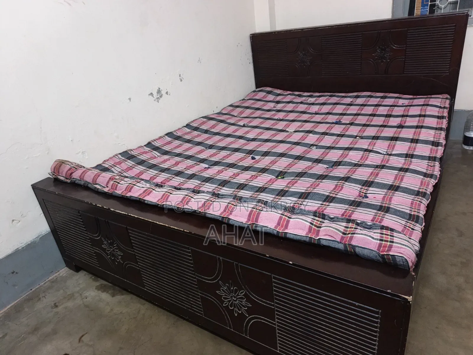 A double bed with mattress will be sold