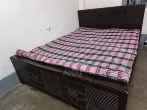 A double bed with mattress will be sold