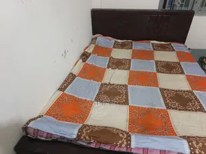 A double bed with mattress will be sold