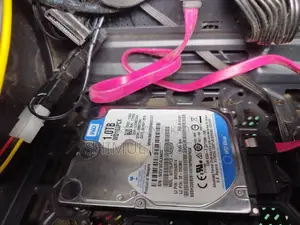 Western Digital (WD) Blue 1TB, 2.5-Inch SATA HDD, Model WD10JPVX.