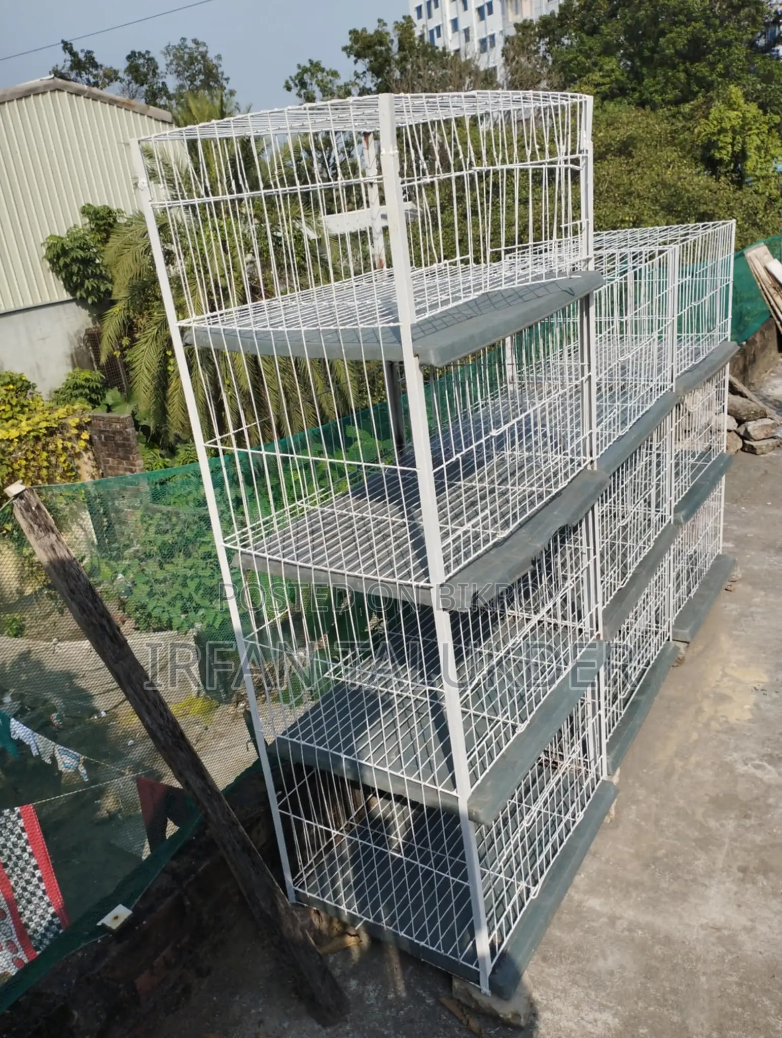A four-compartment pigeon cage for sale