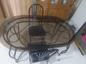 Oval Glass Dining Table Set With 4 Chairs