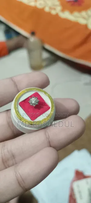 Stone Studded Gold Nose Pin