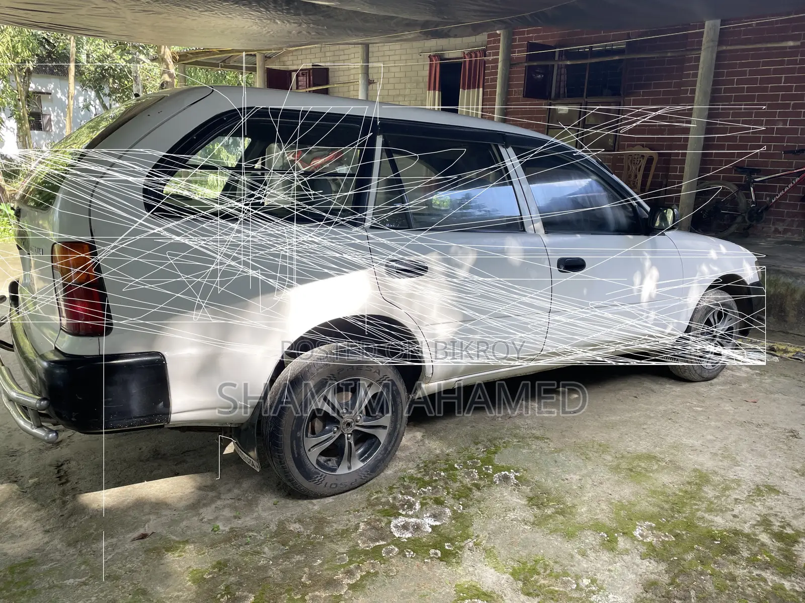 টয়োটা করোল্লা ১৯৯৯ হোয়াইট