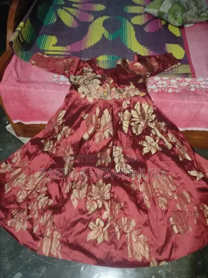 Gown and Two-Strap Shoes