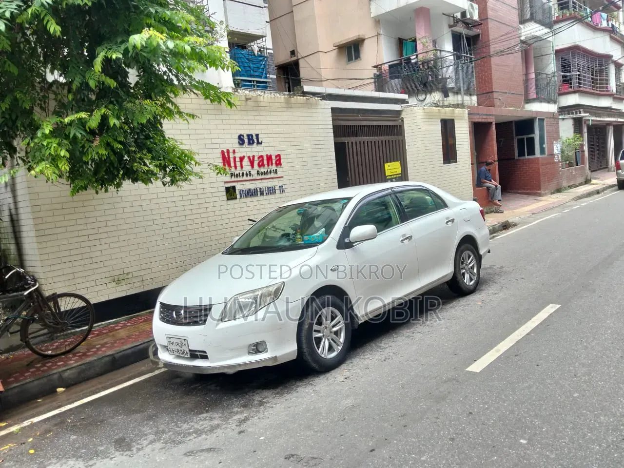 টয়োটা অ্যাক্সিও ২০১২ সাদা