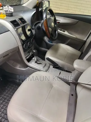 টয়োটা অ্যাক্সিও ২০১২ সাদা